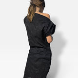 JONES + CO Pinch Shift black dress with embossed floral seersucker texture and off-shoulder neckline