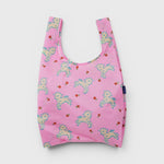 JONES + CO reusable grocery bag in pink ripstop nylon with a cute lamb and rose print pattern