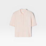 JONES + CO pale pink ribbed short sleeve polo shirt with a smooth knitted collar and cuffs.