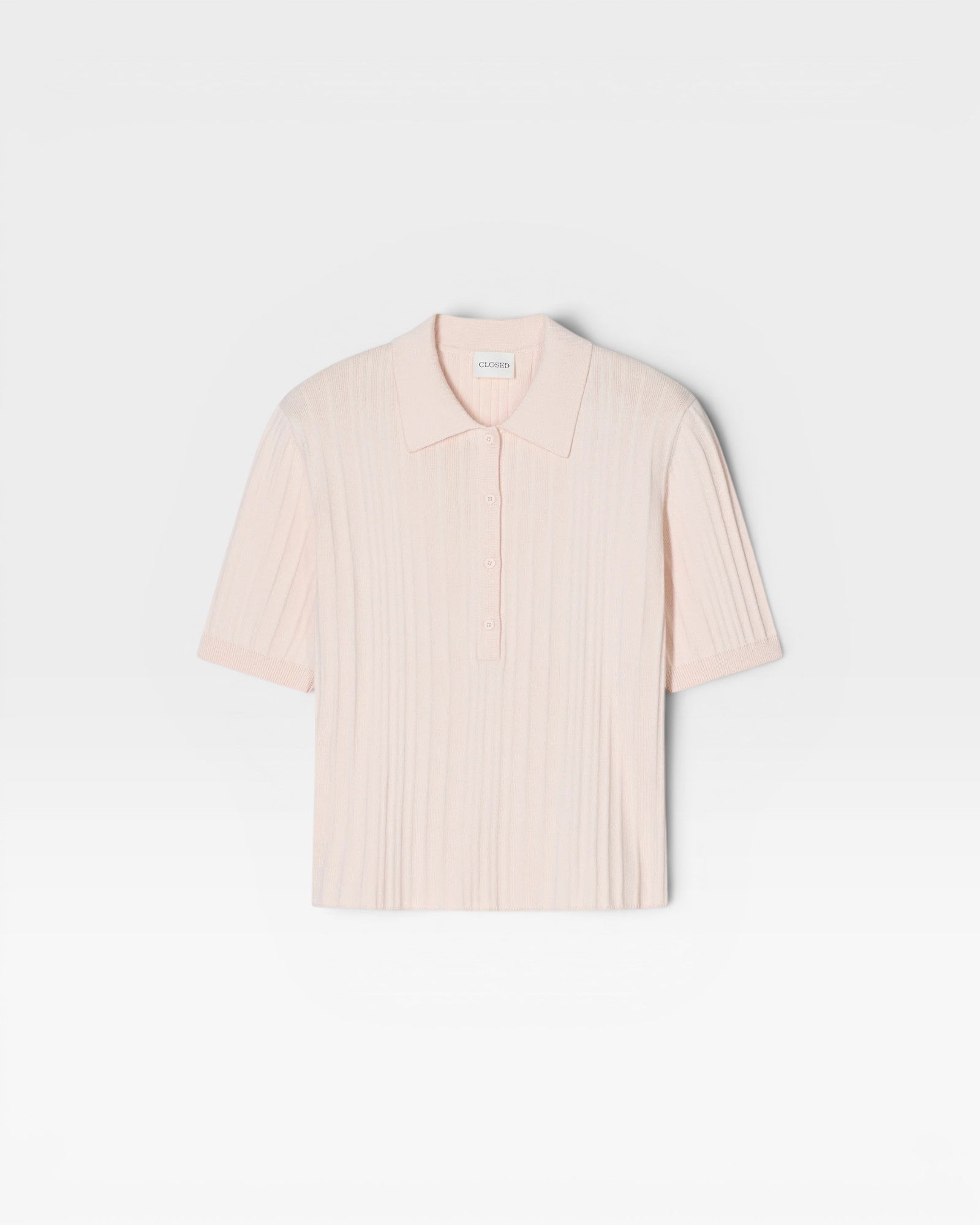 JONES + CO pale pink ribbed short sleeve polo shirt with a smooth knitted collar and cuffs.