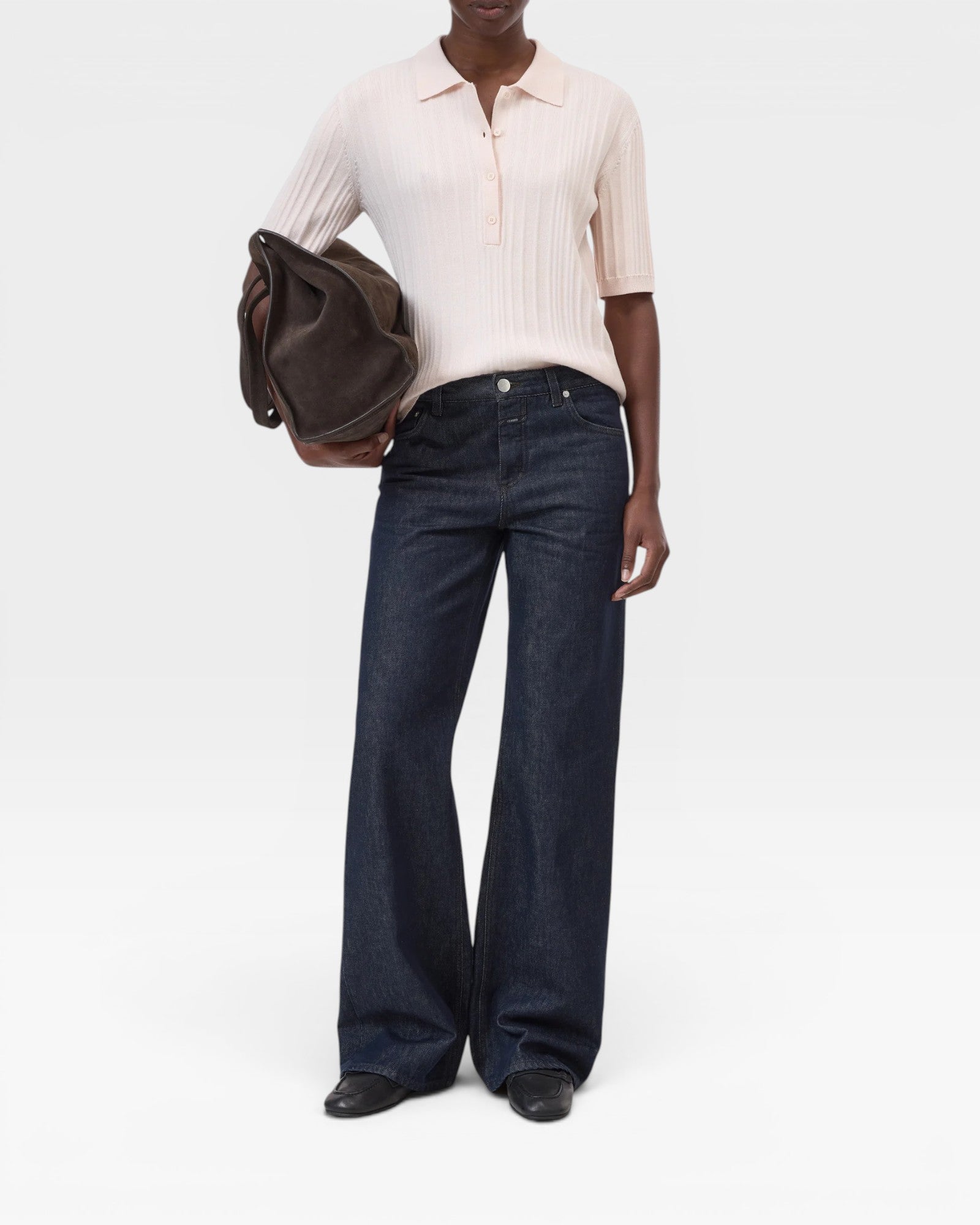JONES + CO light pink ribbed short sleeve polo shirt made from cotton, cashmere, and wool blend.