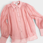 JONES + CO pink sheer crinkled texture button-up shirt with voluminous sleeves and pointed collar.