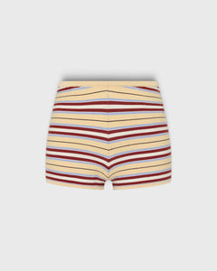 JONES + CO Playa mini shorts in butter yellow with red and blue horizontal stripes, featuring a ribbed waistband.