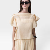 JONES + CO cream pleated linen blend top with flutter sleeves and wide leg pants with drawstring waist.