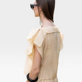 JONES + CO cream pleated linen blend wide leg pants and flutter sleeve top set with off-shoulder option.