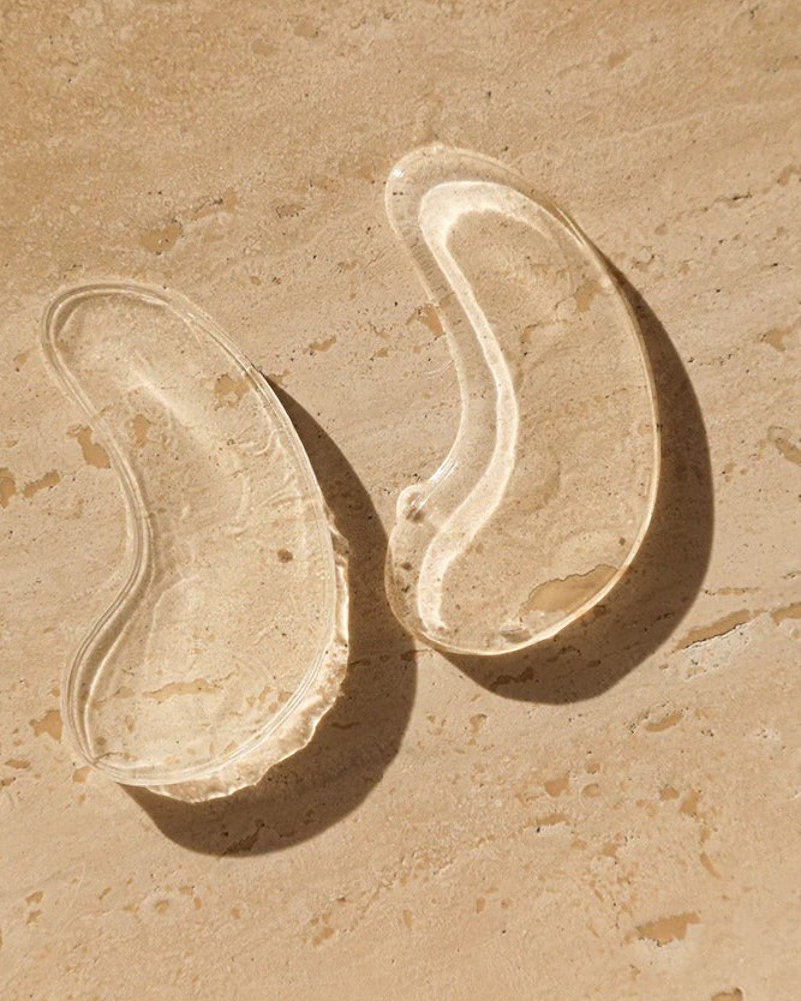 JONES + CO clear hyaluronic acid plumping eye masks to hydrate and reduce puffiness.