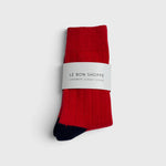 JONES + CO poppy red cashmere blend socks with wide ribbing and contrasting dark heel and toe detail