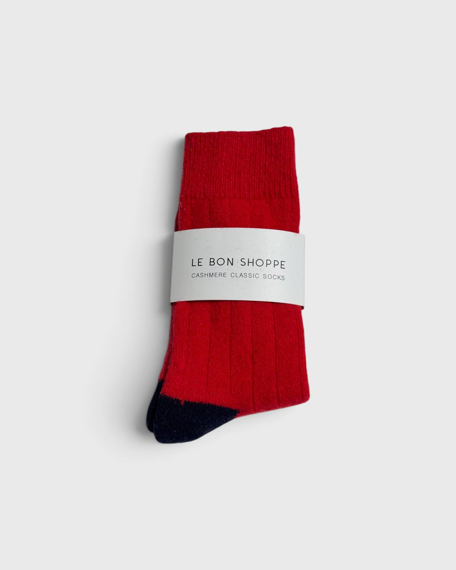 JONES + CO poppy red cashmere blend socks with wide ribbing and contrasting dark heel and toe detail