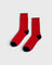 JONES + CO poppy red cashmere blend socks with wide ribbing and contrasting dark heel and toe detail.