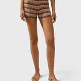 JONES + CO Raya high-rise knit mini shorts in a multi-color zig zag stripe pattern with a scalloped hem