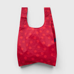 JONES + CO Standard Baggu reusable tote in red with a polka dot pattern made from lightweight ripstop nylon