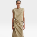 JONES + CO Rini Dress in khaki cotton features an asymmetrical sleeveless top and a draped straight skirt with a side pleat.
