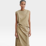 JONES + CO Rini Dress in khaki cotton features an asymmetrical sleeveless top and a draped straight skirt with a side pleat.