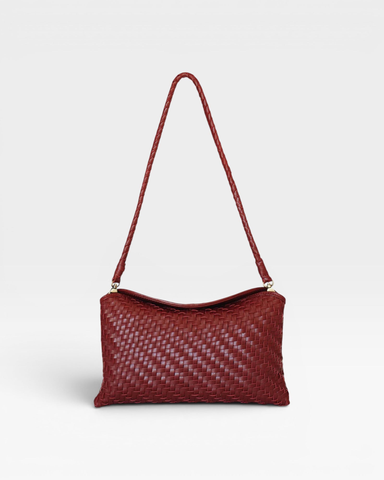 JONES + CO Roux fold-over clutch bag in woven red leather with a removable strap and magnetic closure.