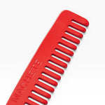 JONES + CO No. 3 Comb in Ruby red, a compact wide-tooth travel comb handcrafted from Italian bio-acetate.