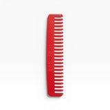 JONES + CO No. 3 Comb in Ruby red, a compact wide-tooth travel comb handcrafted from Italian bio-acetate.