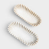 JONES + CO Ruffle Marble Oval Bowl, hand-carved natural marble with scalloped edges and organic silhouette. White.