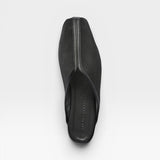 JONES + CO Saanvi Mesh Slide in black. Features a square toe and a sleek, modern design.