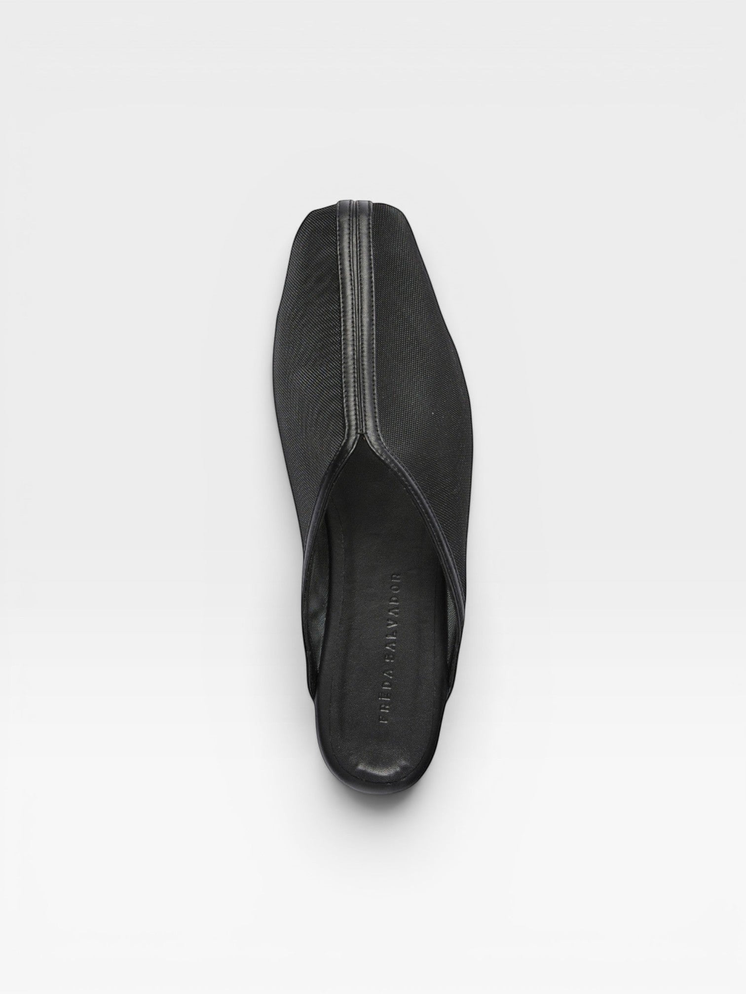 JONES + CO Saanvi Mesh Slide in black. Features a square toe and a sleek, modern design.