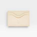 JONES + CO Salina Card Case in milk white vegetable-tanned cowhide. Features 4 card slots and 1 ID slot.
