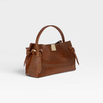 JONES + CO Gyoza Mini handbag in Sierra brown embossed Italian leather with gold-tone hardware and top handle.