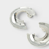 JONES + CO chunky silver-plated brass Rail hoop earrings with a carved three-quarter design and post fastening.