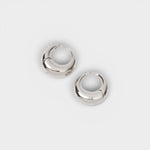 JONES + CO silver-plated brass Alpha Hoop huggie earrings with a chunky tapered design and hinge closure.