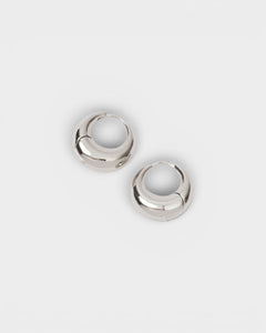JONES + CO silver-plated brass Alpha Hoop huggie earrings with a chunky tapered design and hinge closure.