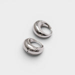 JONES + CO Alpha Hoop silver-plated brass chunky tapered huggie earrings with hinge detail.