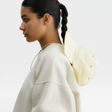 JONES + CO Skipper Hat in bone, a packable sun hat made of 100% nylon with a drawstring.