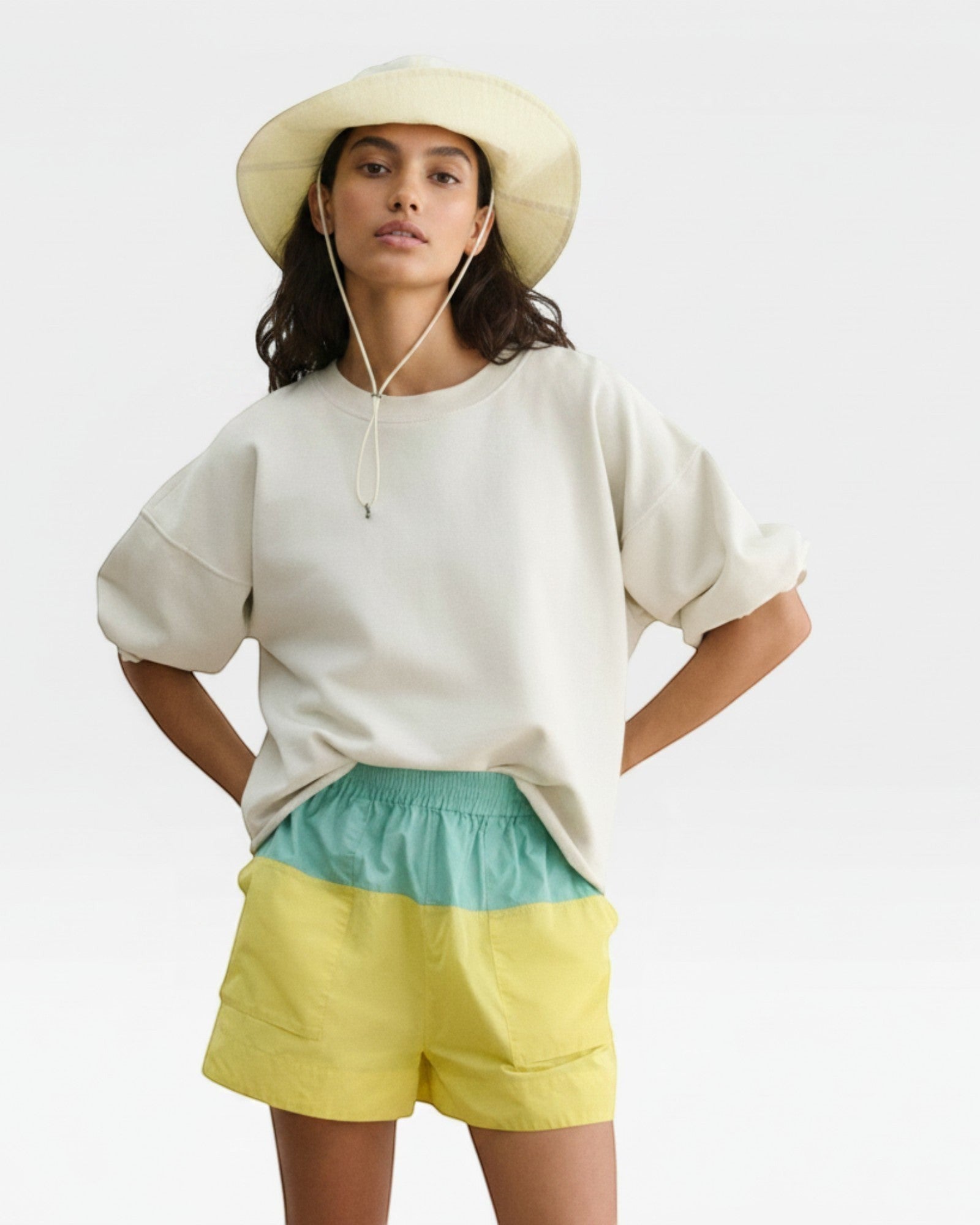 JONES + CO Skipper Hat in bone, a packable sun hat made from 100% nylon with a drawstring.