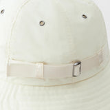 JONES + CO Skipper Hat in Bone, a packable sun hat made from 100% recycled nylon with adjustable strap and metal buckle.
