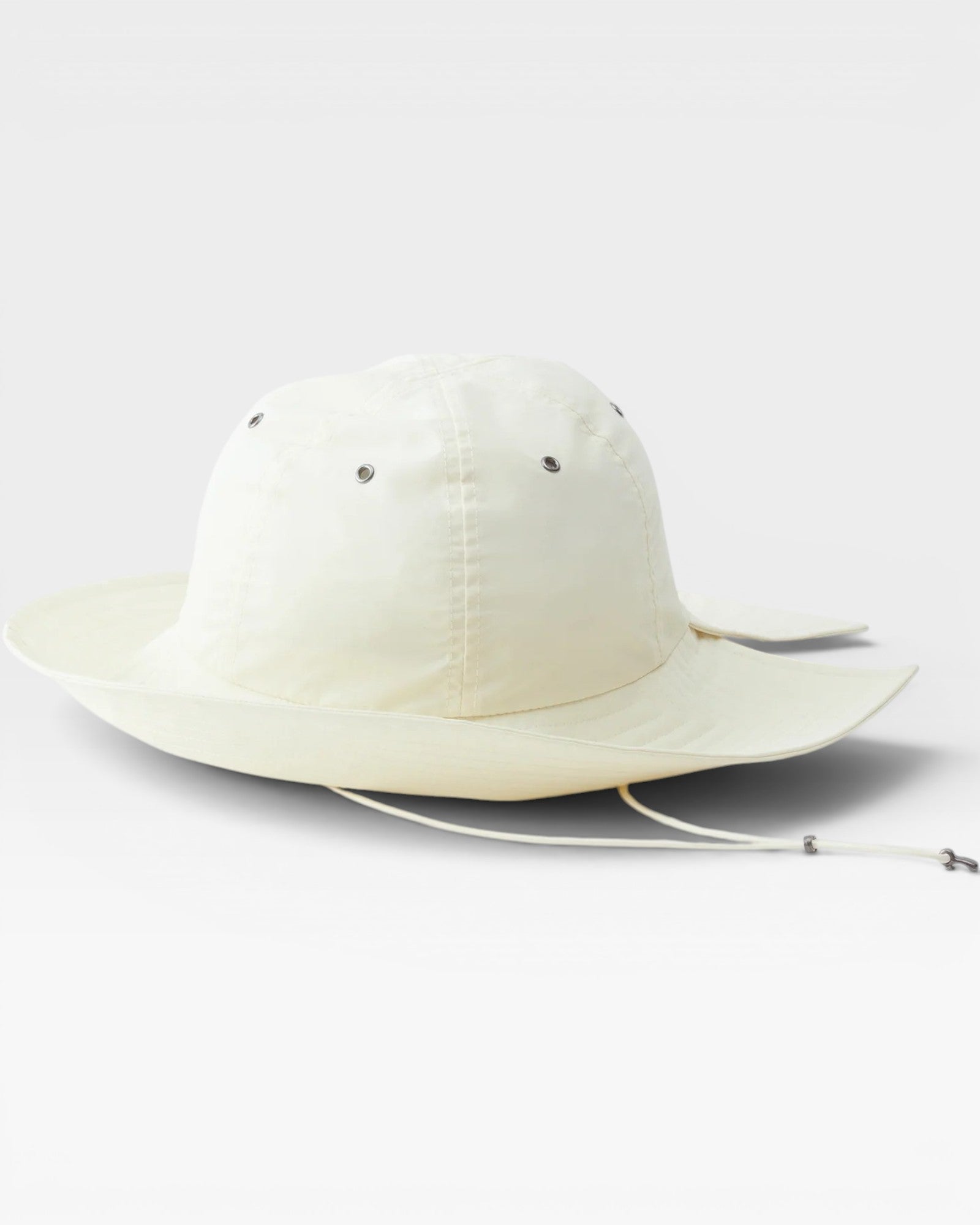 JONES + CO Skipper Hat in bone white recycled nylon. Packable sun hat with drawstring and metal eyelets.