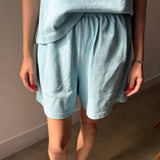 JONES + CO sky blue heavy weight 100% cotton flared basketball shorts with elastic waistband and mid-thigh length.