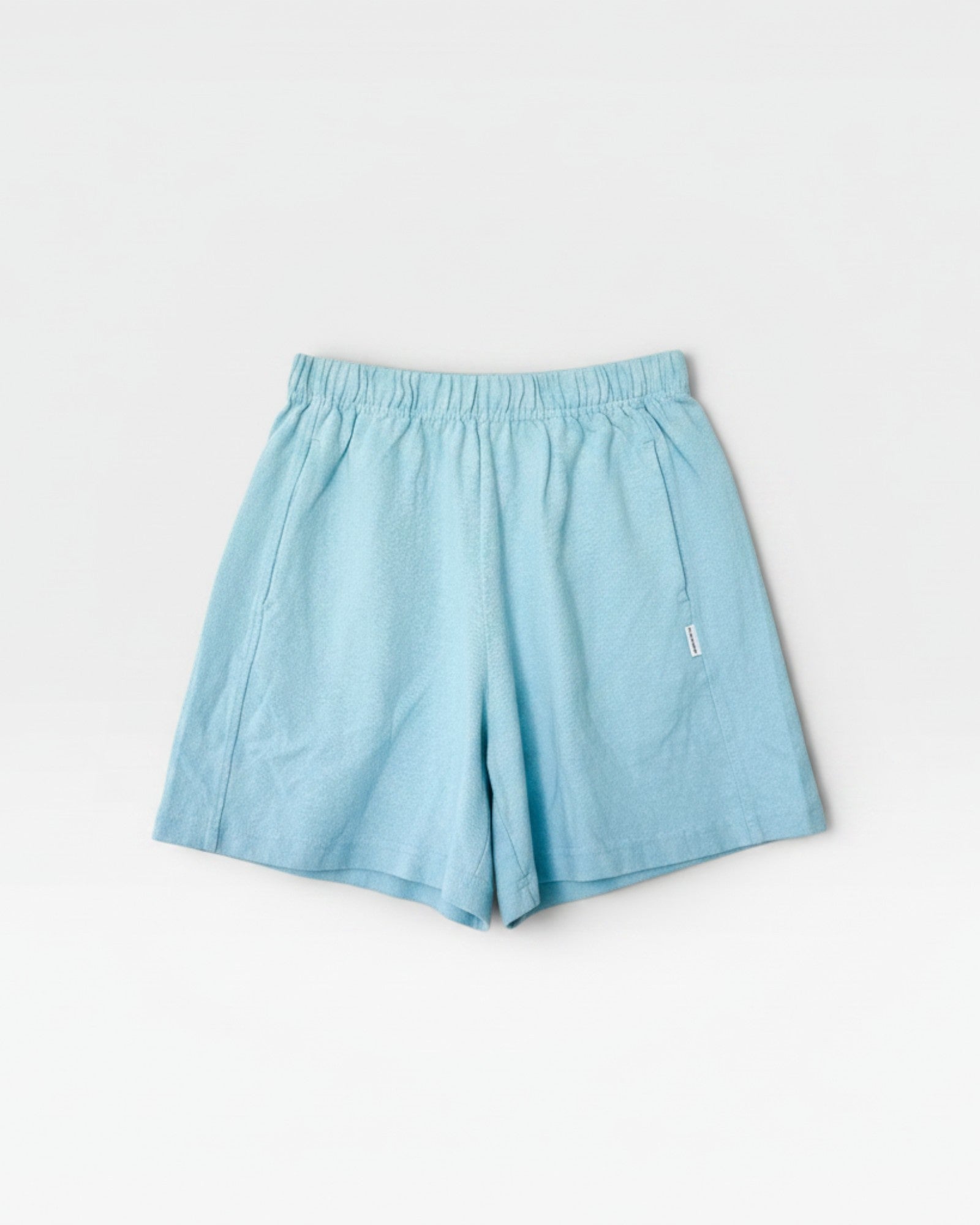 JONES + CO sky blue 100% cotton heavy weight flared basketball shorts with elastic waistband and mid-thigh length.