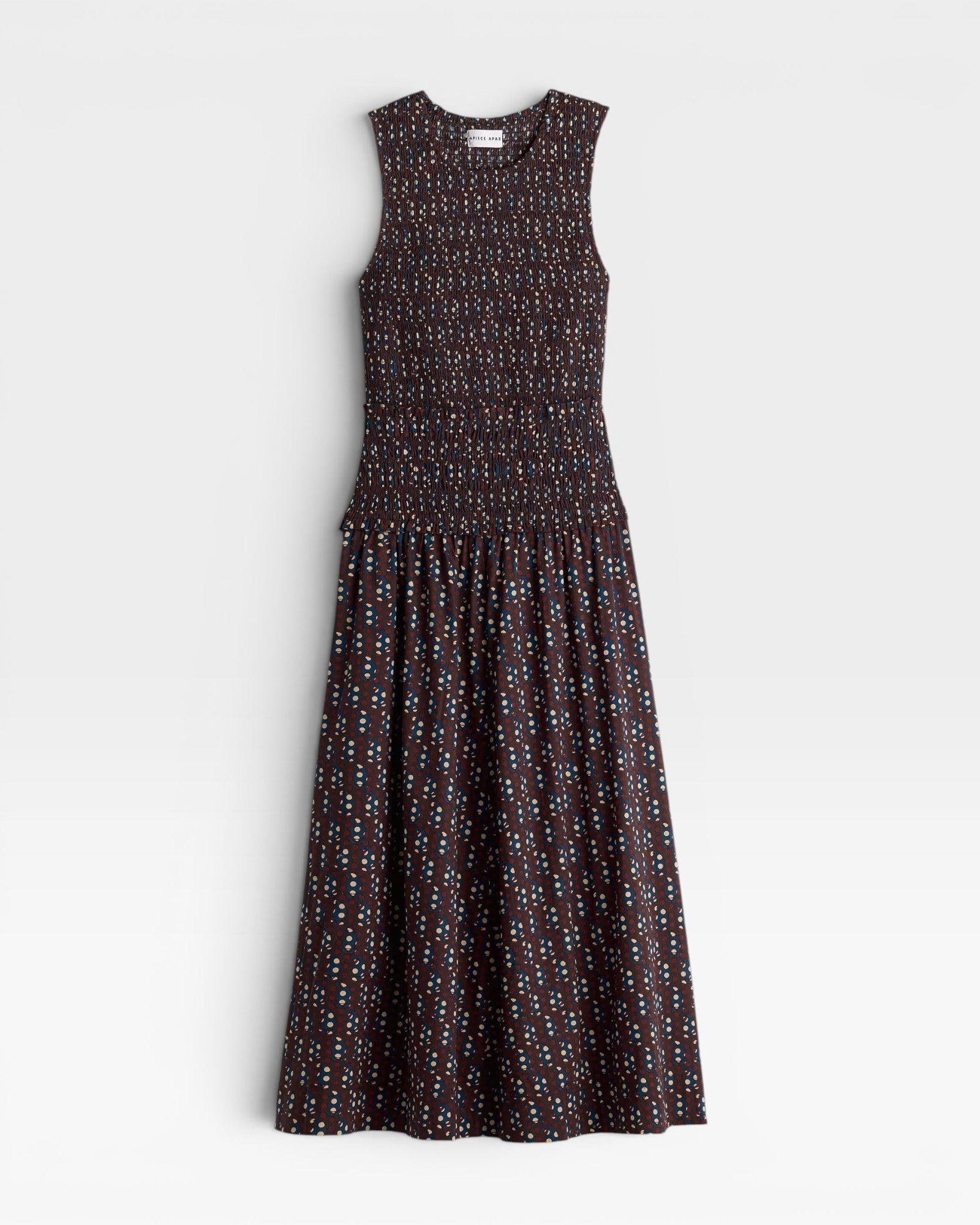 JONES + CO brown smocked maxi dress with block print polka dot pattern and sleeveless design.