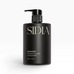 JONES + CO SOAKED The Cream La Crème in Cypress & Musks, a black pump bottle with white text.