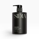JONES + CO SOAKED The Cream La Crème in Cypress & Musks, a black pump bottle with white text.