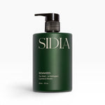 JONES + CO SOAKED The Wash champagne-hued hand and body cleanser with juniper, cypress, and musks. Infused with avocado butter, shea butter, and aloe vera.