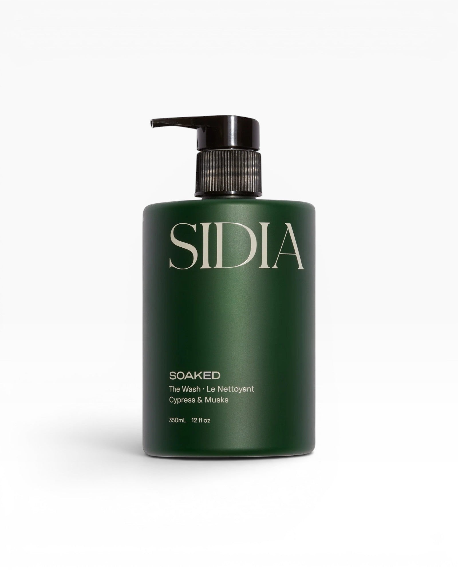 JONES + CO SOAKED The Wash champagne-hued hand and body cleanser with juniper, cypress, and musks. Infused with avocado butter, shea butter, and aloe vera.