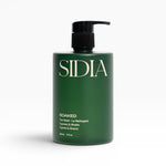 JONES + CO SOAKED The Wash hand and body cleanser in champagne hue with cypress and musks scent.