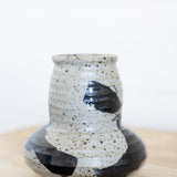 JONES + CO handmade ceramic vase with speckled off-white glaze and bold black brushwork.