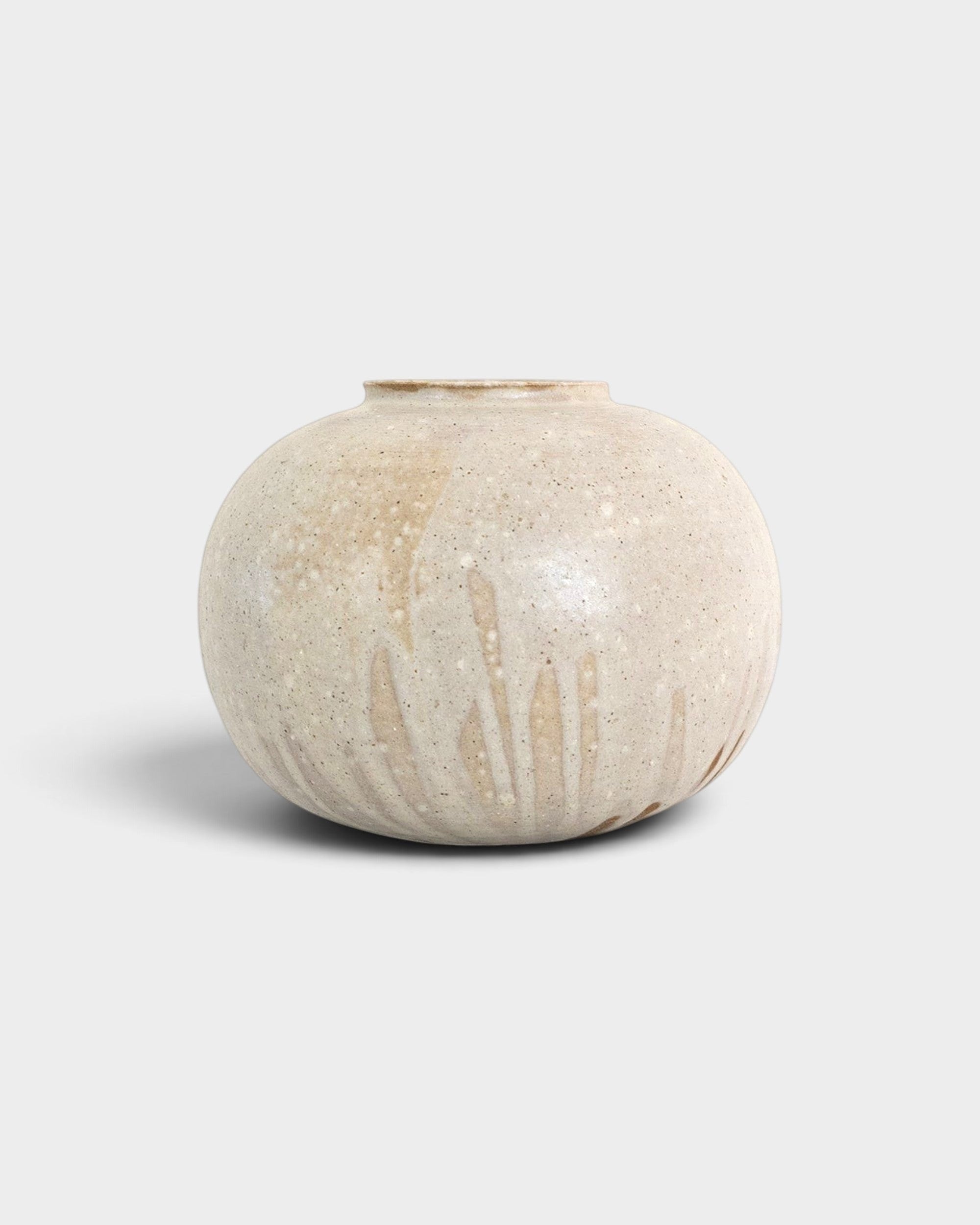JONES + CO handthrown ceramic vase with a speckled beige finish and subtle vertical texture in a rounded shape.
