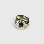 JONES + CO Dean ring in .925 sterling silver featuring a bold, sculptural design with a blue star sapphire center.