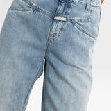 JONES + CO Stover-X relaxed light blue organic cotton denim jeans with signature X-pockets and cropped leg fit.