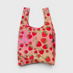 JONES + CO Baggu reusable grocery bag in pink and red strawberry blossom print made from durable ripstop nylon