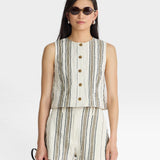 JONES + CO women's textured cream shorts with vertical stripes in brown and green, featuring a drawstring waist and side slits.