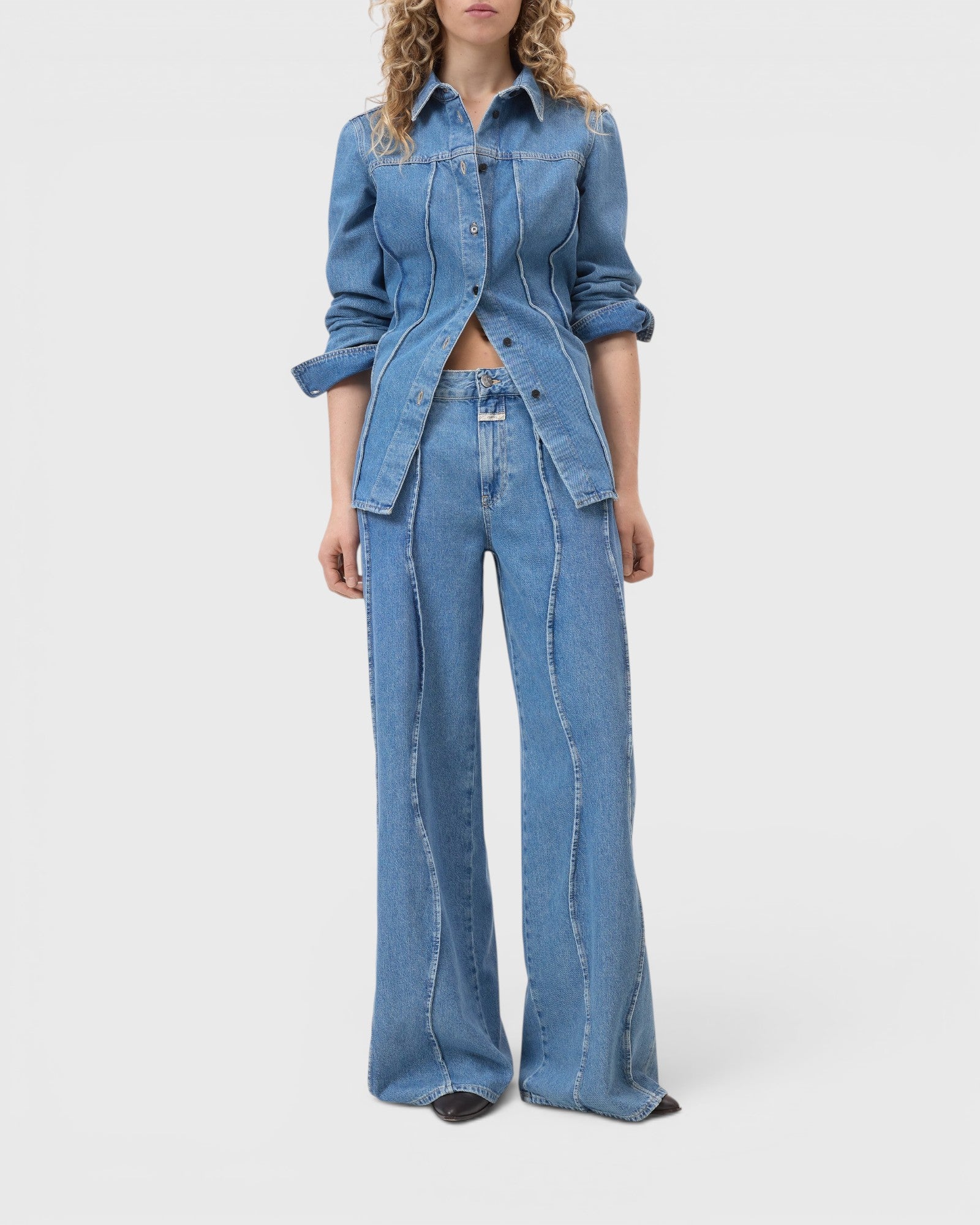 JONES + CO Tali-X mid blue wide-leg denim jeans with high waist and signature curved seaming in recycled cotton