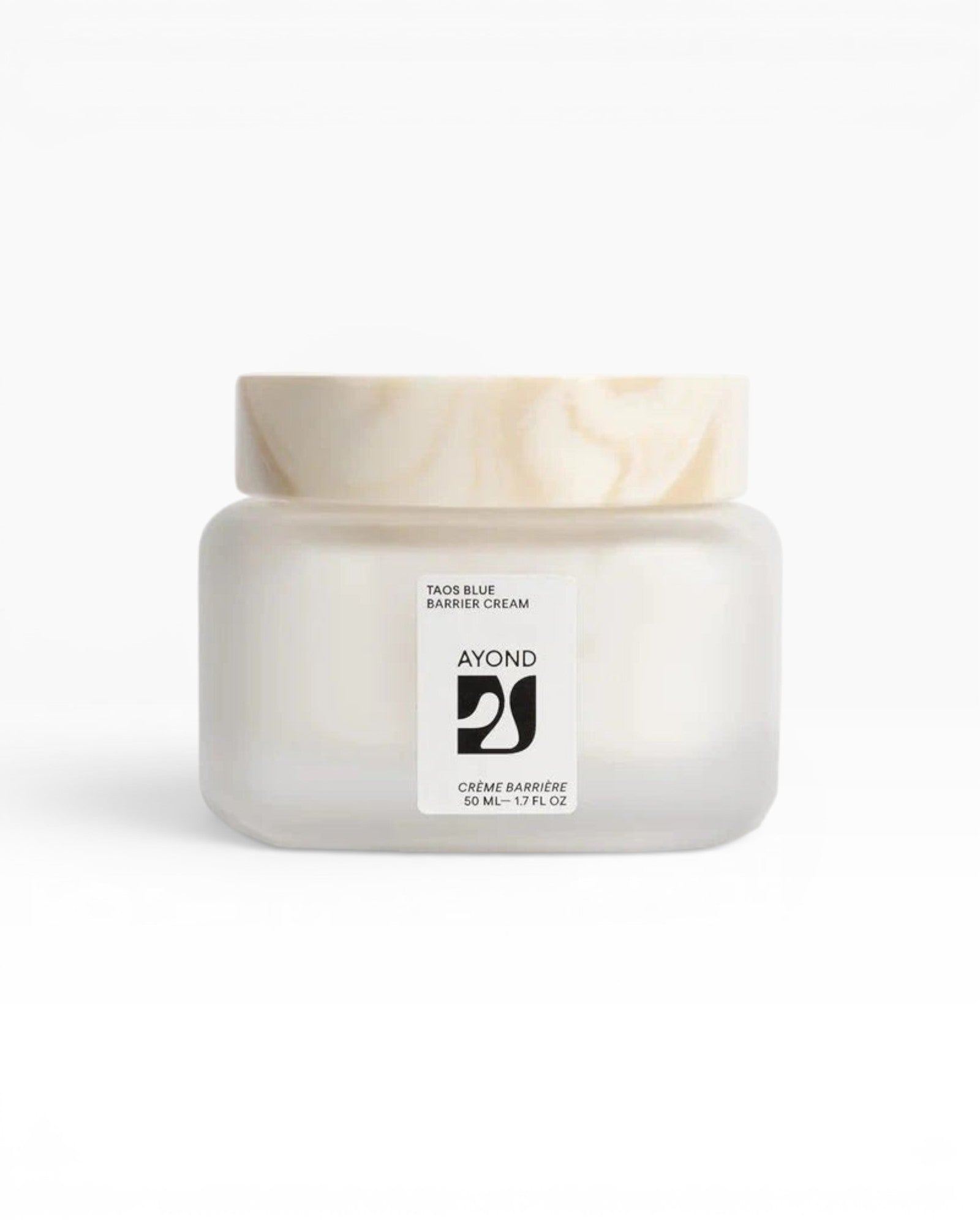 JONES + CO Taos Blue Barrier Cream, a lightweight, fast-absorbing facial moisturizer in a frosted glass jar with a marbled lid.