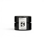 JONES + CO Taos Blue Barrier Cream in a small black jar, lightweight formula to hydrate and protect skin.